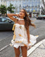 Isabel | Halter Neck Ruffled Printed Mini Dress