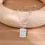 “Saint” Moissanite Cross Tag Necklace
