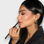 Nuna – Golden Stud Earrings with Sculptural Character
